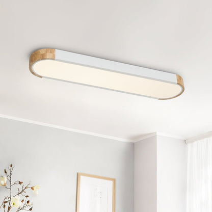 Imogen white oval LED ceiling light in a bright room