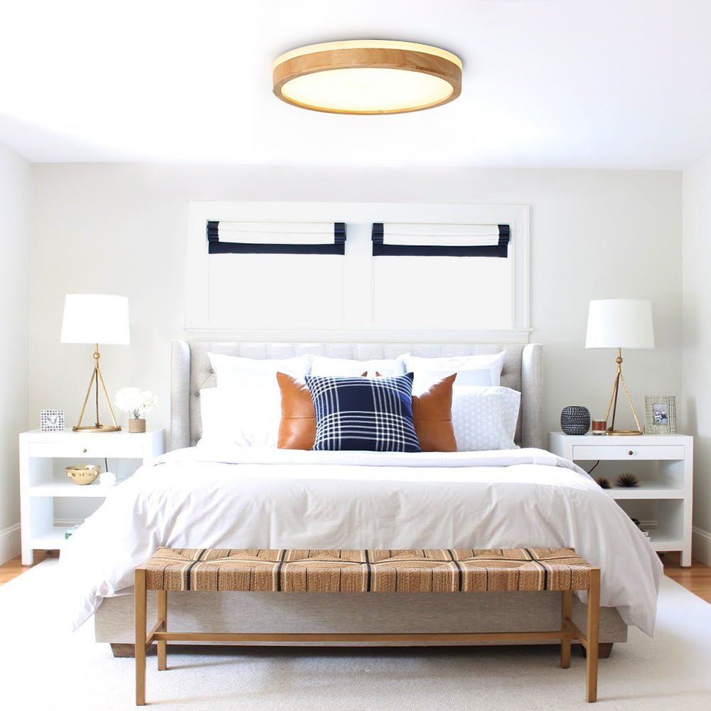 Liliana round LED ceiling light – above a bed