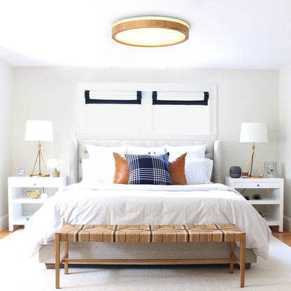 Liliana round LED ceiling light – above a bed