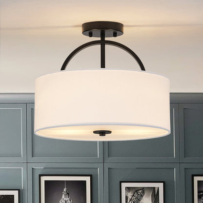 Isadora linen drum ceiling light – in black against a dark panelled wall