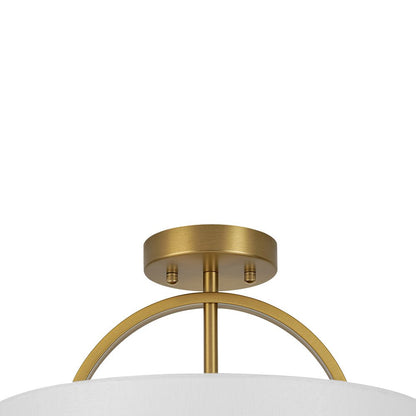 Isadora linen drum ceiling light – brass arch close-up