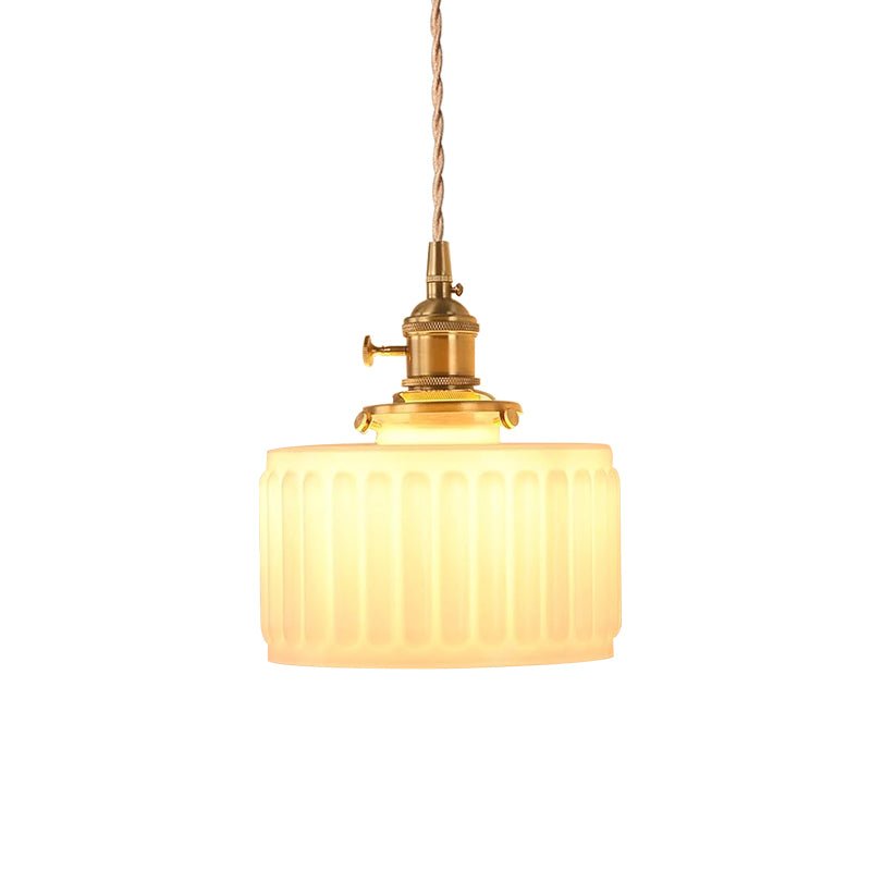 Juliette ribbed glass drum pendant light – white opal glass lit on white