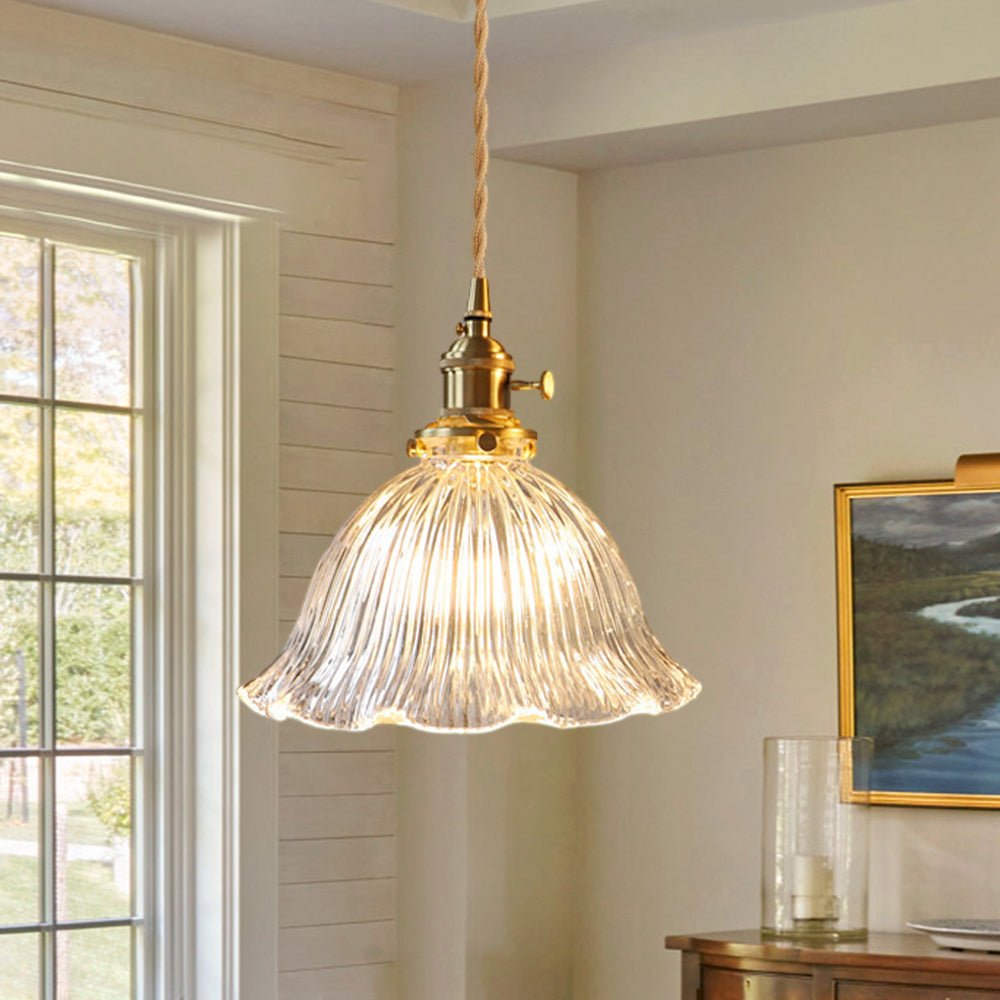 Rosalie flower glass pendant light – clear glass lit by a window