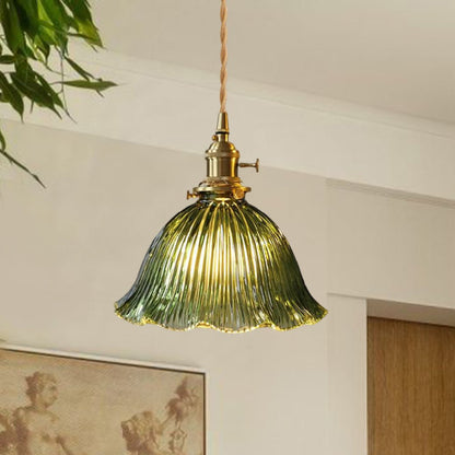 Rosalie flower glass pendant light – in green glass in a bright room