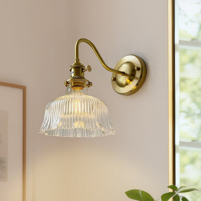 Fiorella flower wall light – in clear glass in a room