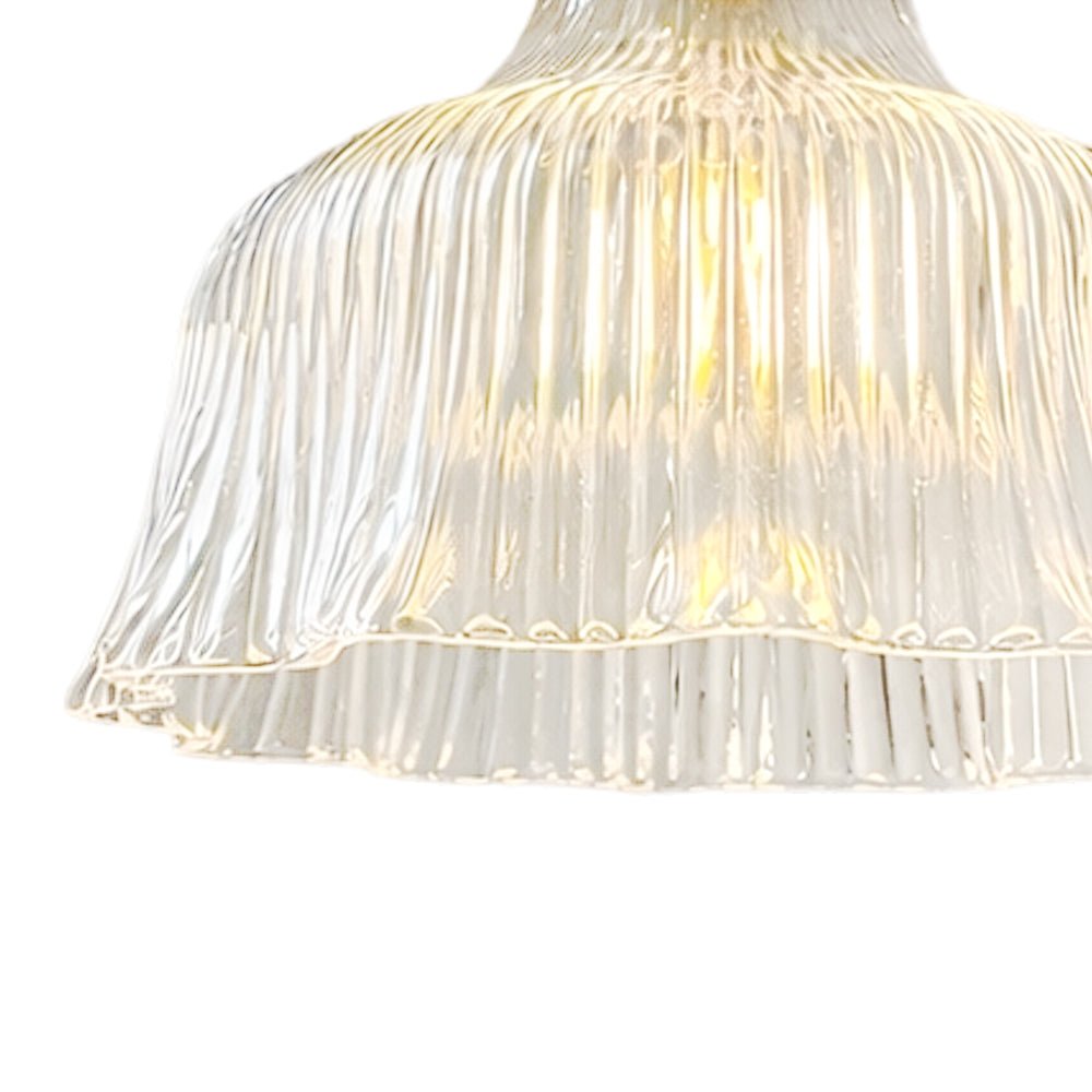 Fiorella flower wall light – clear shade, lit close-up