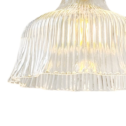 Fiorella flower wall light – clear shade, lit close-up