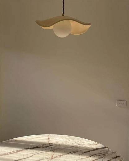 Giselle wavy resin pendant – lit, seen from below
