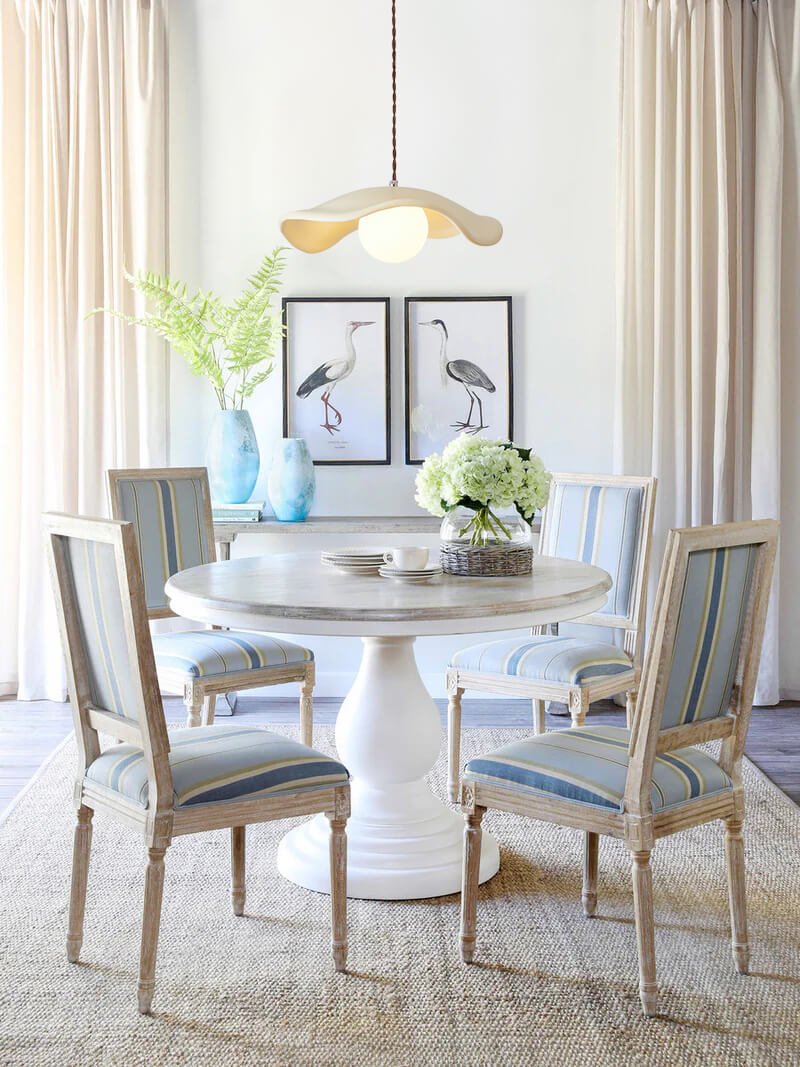 Giselle wavy resin pendant – over a round dining table