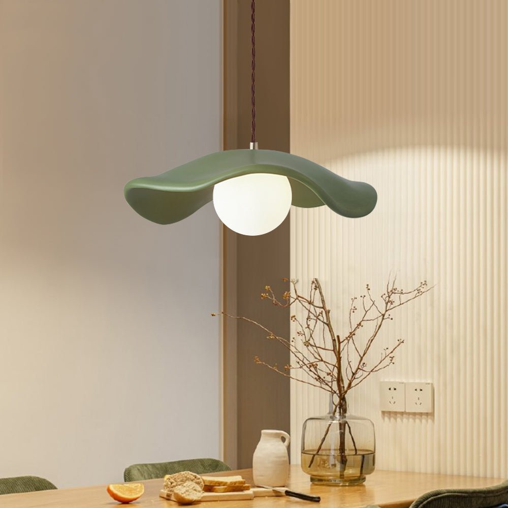 Giselle wavy resin pendant – in green in a room