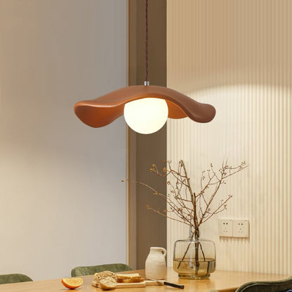 Giselle wavy resin pendant – in orange in a room